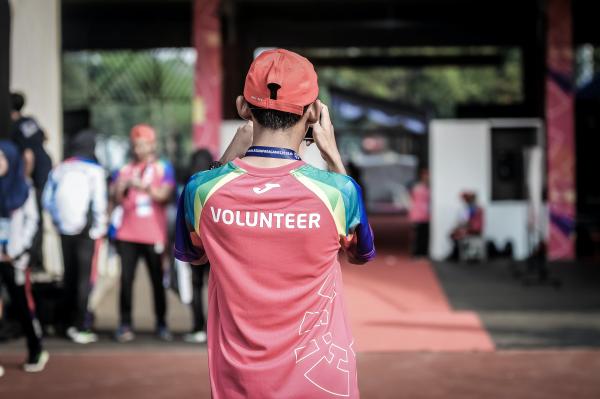 A volunteer takes part in a volunteering scheme.