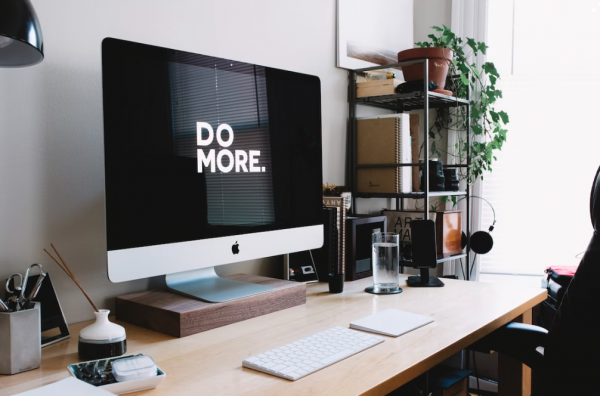 What is CSR? Image of a computer monitor, with white text which reads "Do More" on a black background.